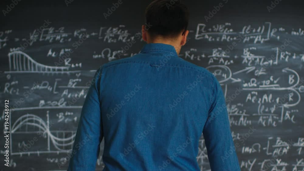 Brilliant Young Acamedic Approaches Blackboard with Complex Mathematical Formula/ Equation Written on it, Starts Thinking about Solution. Brilliant Young Acamedic Approaches Blackboard with Complex Mathematical Formula/ Equation Written on it, Starts Thinking about Solution.