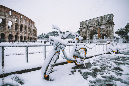 Photography A lovely day of snow in Rome, Italy, 26th February 2018: a view of snowy bikes b