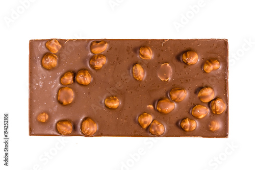 Dark chocolate with hazelnuts isolated on a white background