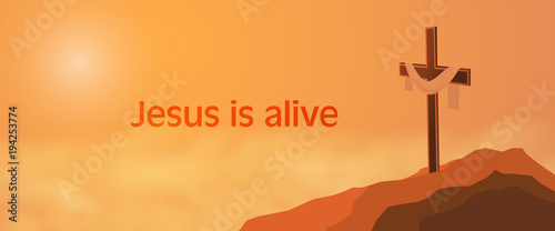 Easter background. Cross on rocks with shroud and text : Jesus is alive.