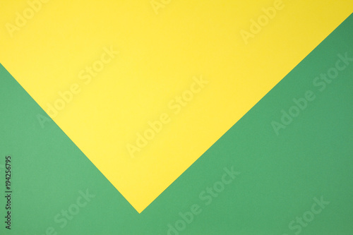 Yellow and green color papers geometry flat composition background