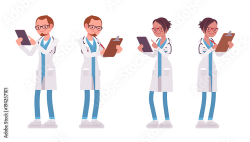Male and female doctor standing with clipboard and tablet