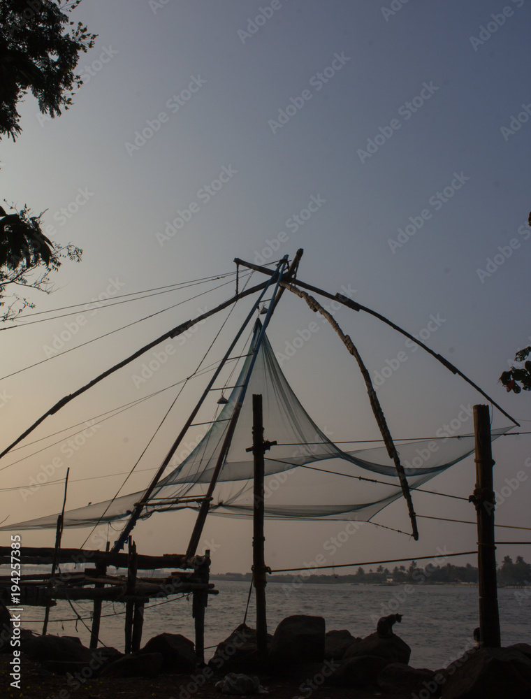 Chinese fishing net at sunset in Kochi