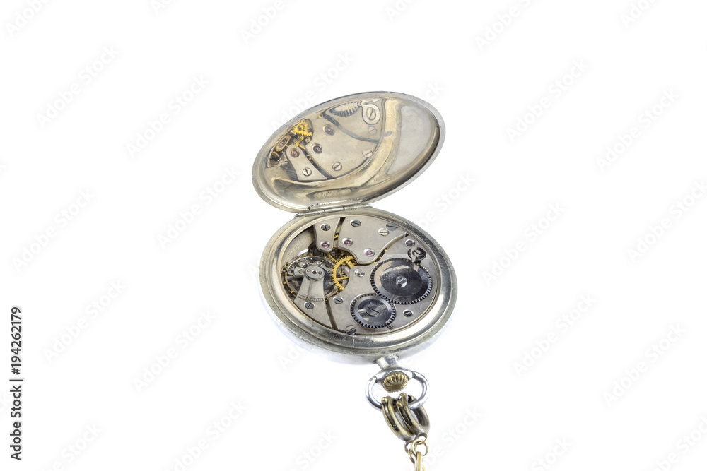 Vintage pocket watches with open back cap, isolated on a white background