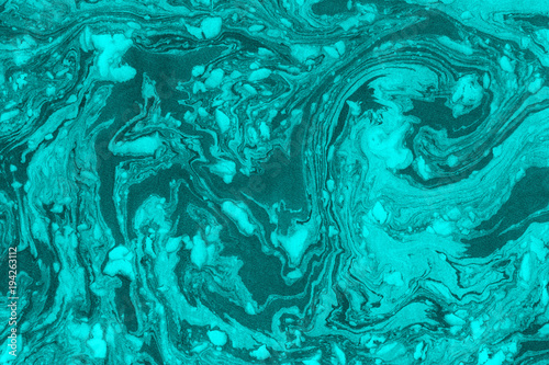 Suminagashi marble texture hand painted with cyan ink. Digital paper 859 performed in traditional japanese suminagashi floating ink technique. Sublime liquid abstract background.