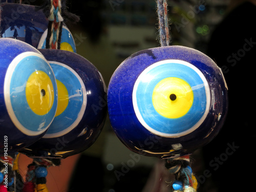 Nazar amulets in a Turkish shop. Fatima's eye, protection against the Evil Eye symbol. Traditional Turkish talisman photo