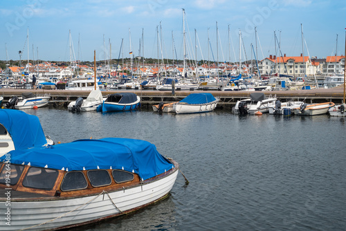 Pier with parked yachts in the marine town on the Southern cost of Sweden. © ianachyrva