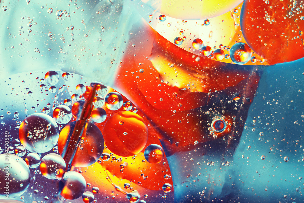 abstract colorful background, oil drops on water