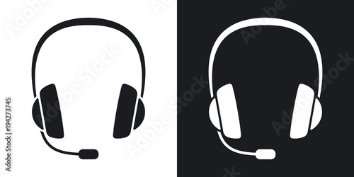 Vector headphones with microphone icon . Two-tone version on black and white background