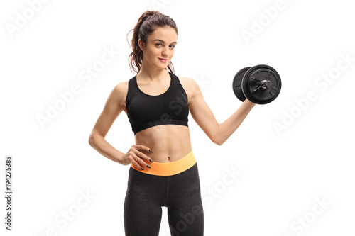Fitness woman holding a dumbbell