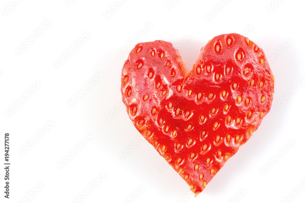 Red strawberry heart isolated on white background in concept valentine's day. Red strawberry heart isolated on white background in concept valentine's day.