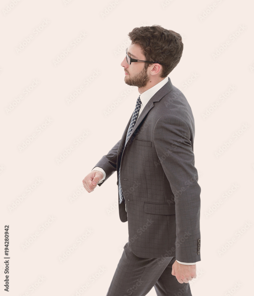 Successful business man confidently goes forward