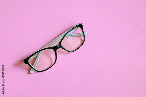 Glasses on color background. Place for text and design.