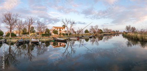 Albufera nature reserve in Catarroja Valencia Spain gigapan harbor of the main irrigation ditch that floods the rice fields old traditional wooden boats. Latin sailing ships