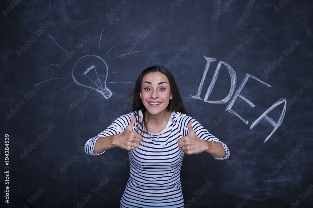 It will be cool, do not hesitate. Smiling attractive young woman shows that all goes well It will be cool, do not hesitate. Smiling attractive young woman shows that all goes well