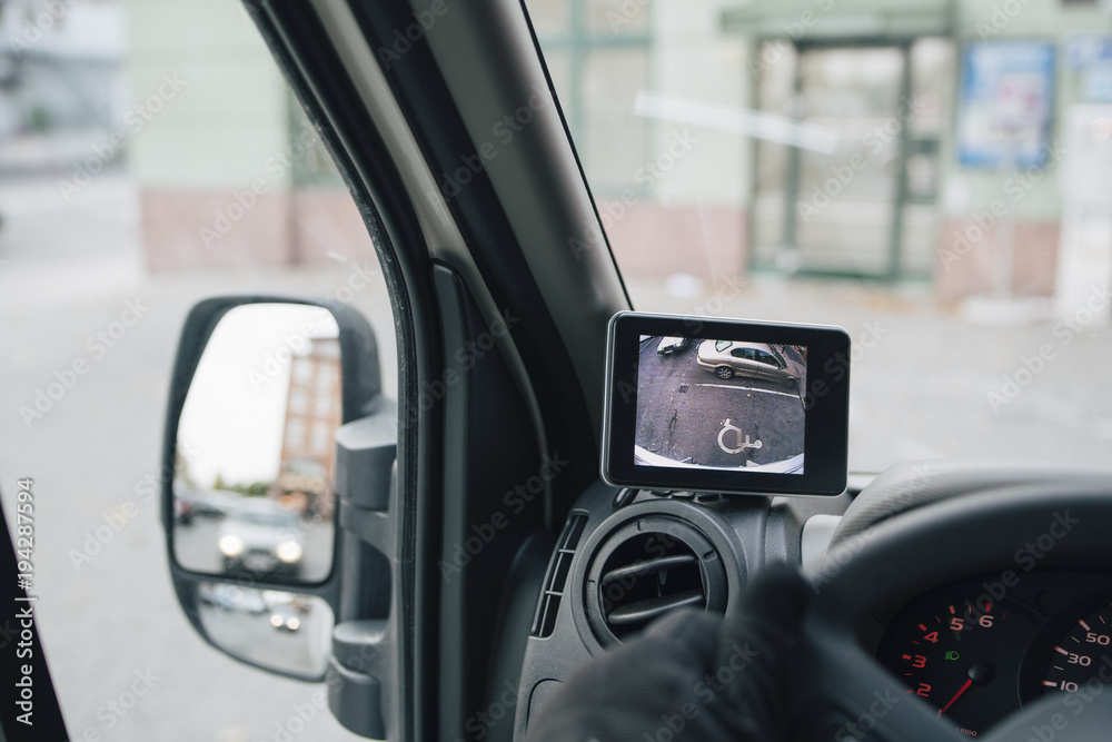 Close-up of monitor on dashboard in delivery van