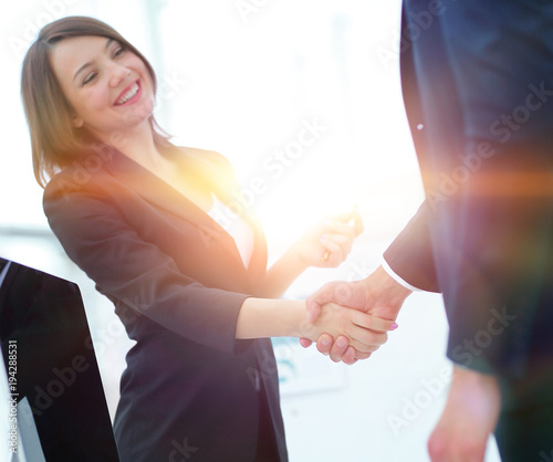 Fototapeta Naklejka Na Ścianę i Meble -  business colleagues shaking hands after a successful presentation.