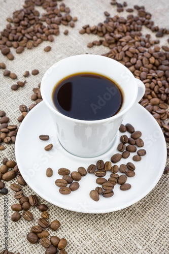 Cup of coffee in burlap