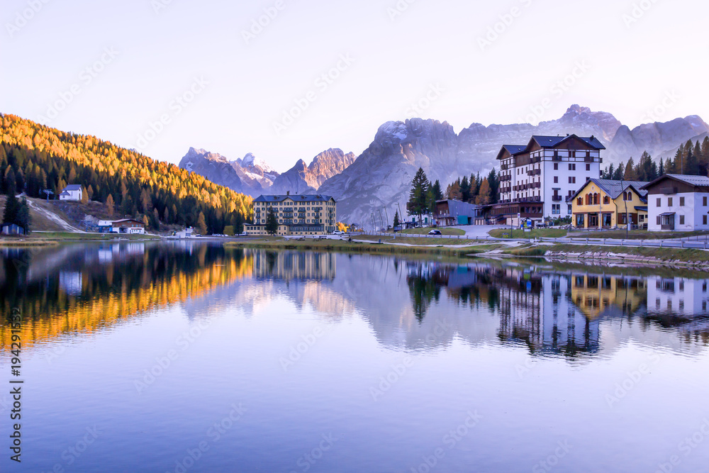 Misurina Lake in Dolomites mountains in Italy with reflections in lake, Misurina lake in national park with autumn landscape in Dolomite Alps, Italy, Europe, Traveling concept background.