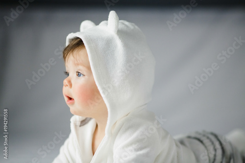 Pretty little baby in a hoody with ears