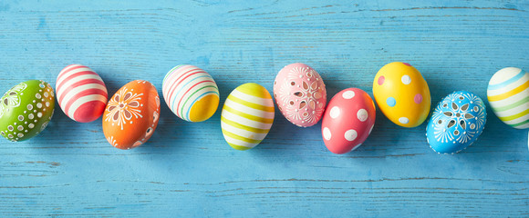 Row of colorfully painted Easter eggs