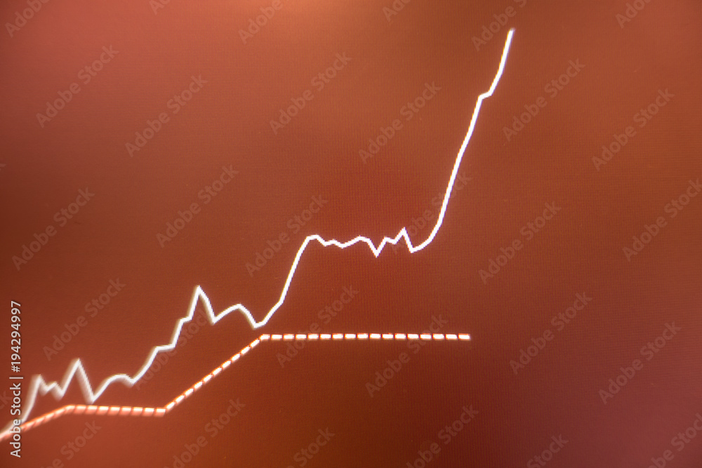 Stock exchange market graph analysis in red background