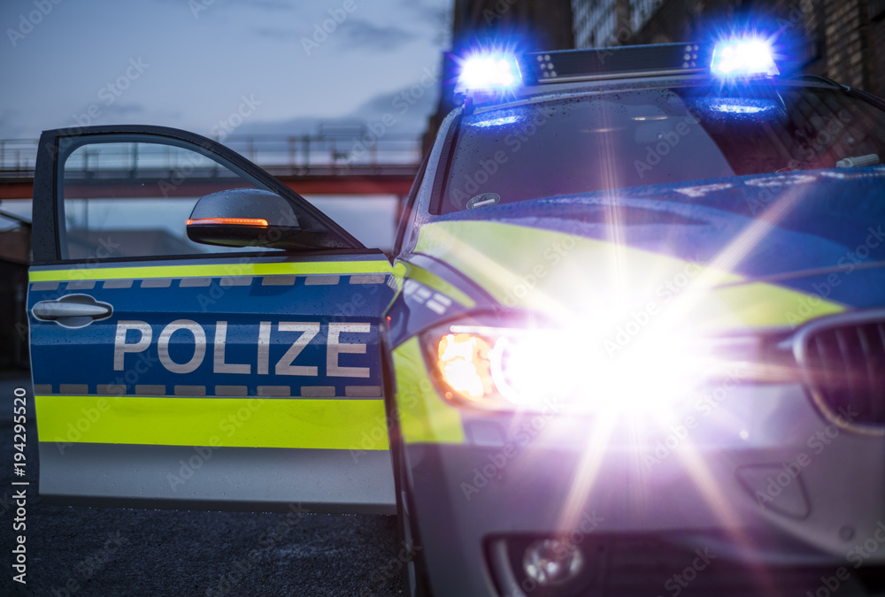 Polizeiauto mit Blaulicht (Deutschland) foto de Stock