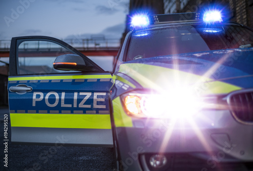 Polizeiauto mit Blaulicht (Deutschland) photo