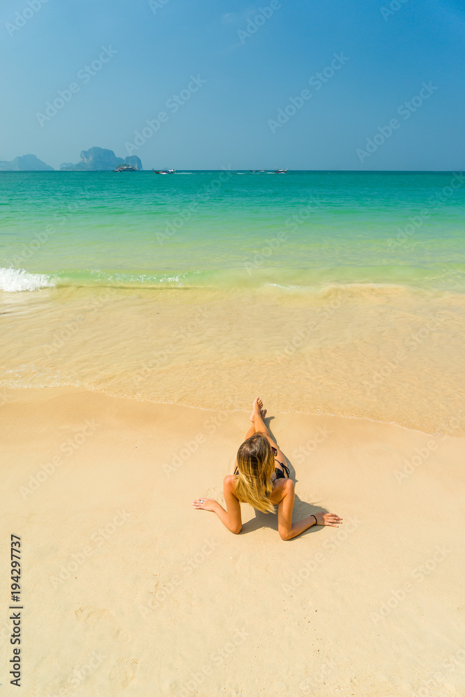 woman resting at the tropical Thailand Railay beach woman resting at the tropical Thailand Railay beach