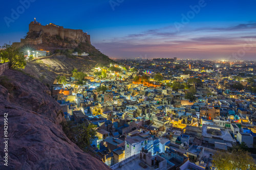 Blue city and Mehrangarh fort on the hill at night in Jodhpur, Rajasthan, India © SANCHAI