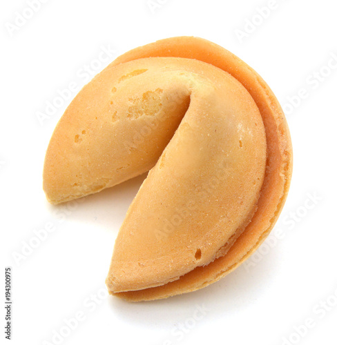 Photo of an isolated fortune cookie on a white background.