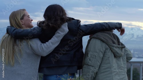 Group Of Best Friends Watch Sunset In Winter At An Overlook In City, They Put Their Arms Around Each Other - Shot On Red Scarlet-W Dragon In 4K/ Slow Motion