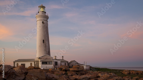 A view of Cape St Francis lighthouse in South Africa at sunset
