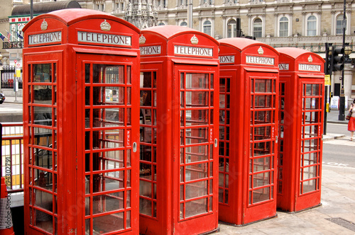 Four famous english red phone booth in the row