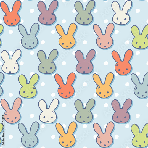 Seamless pattern with cute rabbit muzzles and polka dots