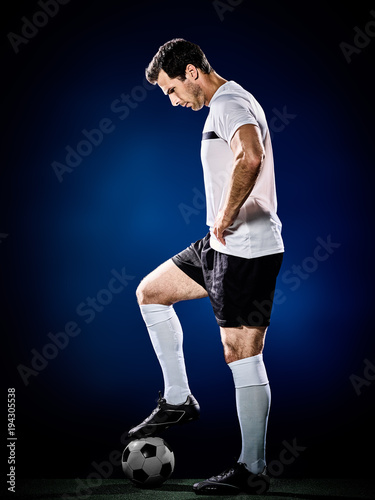 one caucasian soccer player man isolated on black background © snaptitude