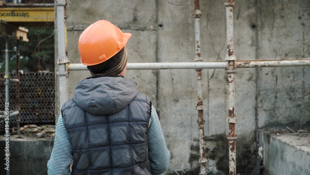 Construction Worker Planning Constructor Developer Concept. Clip. Builder in the helmet shows your finger up