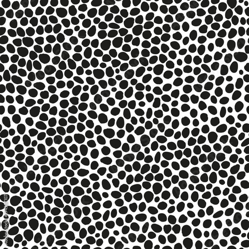 Seamless pattern of black peas in white background. Stones texture.
