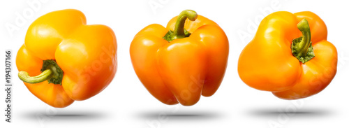 Collection of sweet yellow bell pepper isolated on white background with shiny reflections