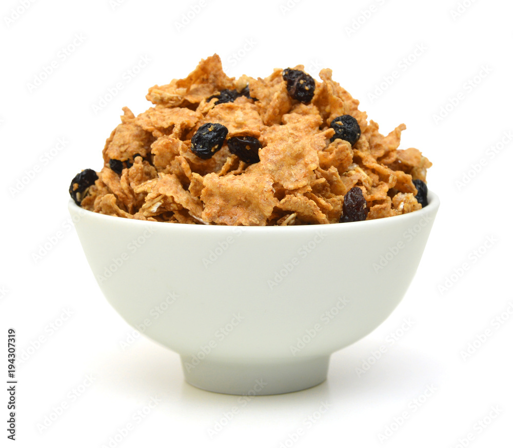 bran and raisin cereal in a bowl , top view bran and raisin cereal in a bowl , top view