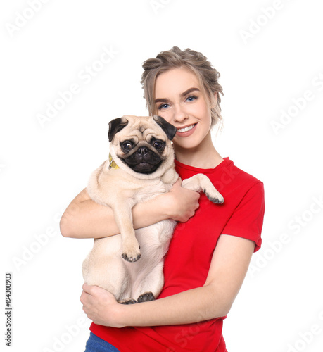 Young woman with cute pug d...