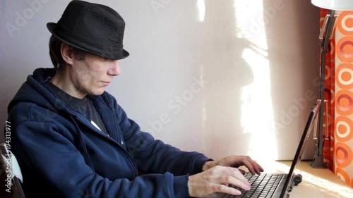 man behind laptop