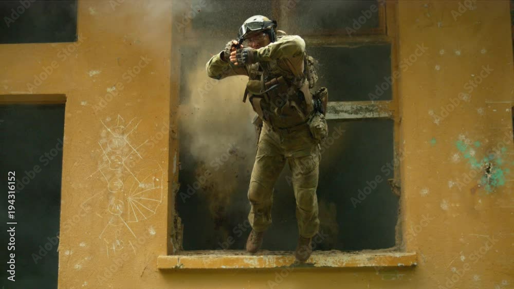 Soldier jumping after explosion, slow motion Soldier jumping after explosion, slow motion