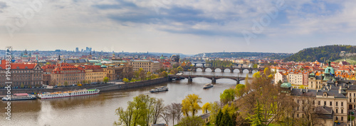 Scenic panoramic view of bridges on the Vltava river and historical center of Prague, buildings and landmarks of old town. Prague, Czech Republic