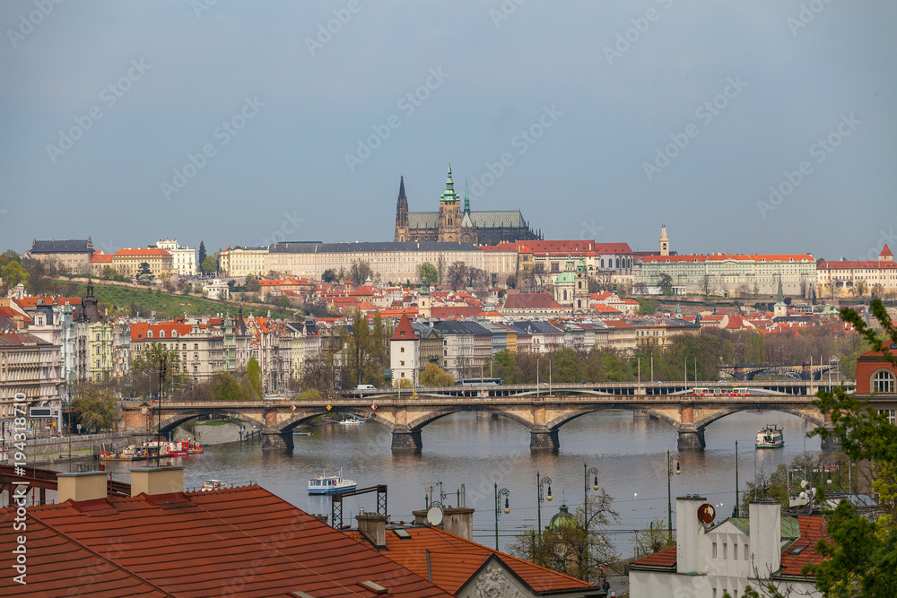 Fototapeta premium View of Vltava river in Prague and Charles bridge and the Castle, Czech Republic