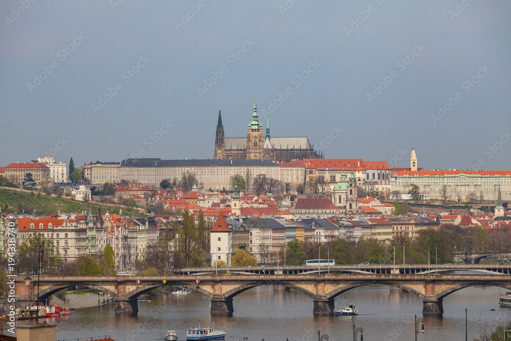 View of Vltava river in Prague and Charles bridge and the Castle, Czech Republic