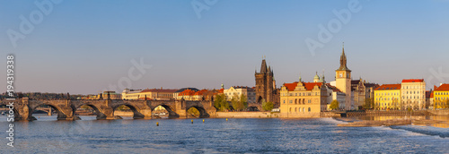 Snset over Charles Bridge and old town of Prague, Czech Republic. Wide panoramic view. photo