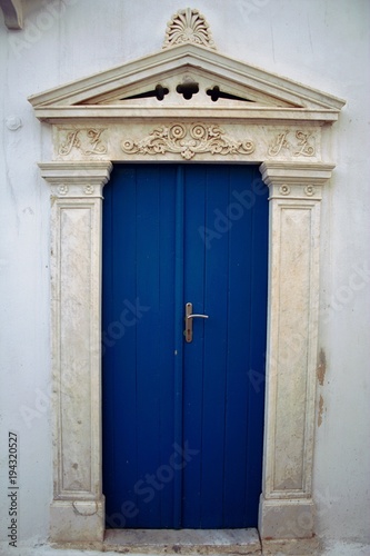 Marble decoration on a house's entrance at Pyrgos village, Tinos island, Cyclades, Greece.