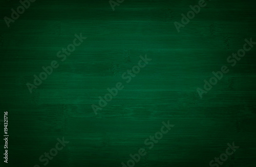 Green wooden wall background.