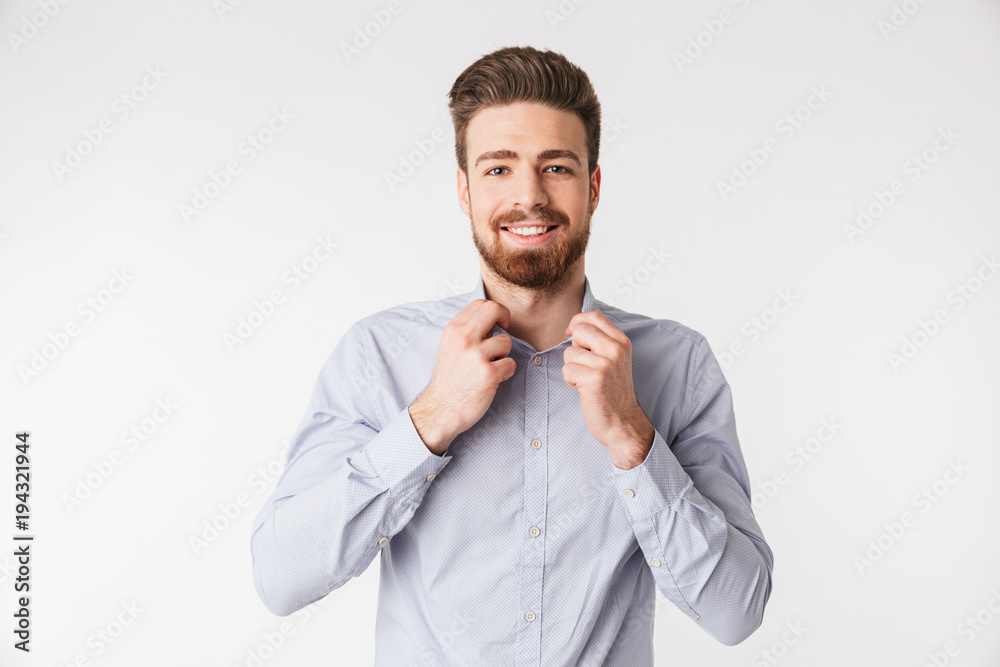 Portrait of a charming young man dressed in shirt Portrait of a charming young man dressed in shirt